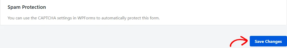 Una flecha apuntando al botón Guardar cambios en la parte inferior del separador Configuración, debajo de la sección Protección contra spam.