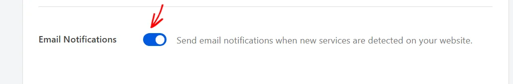 An arrow pointing at the Email Notifications toggle, switched on, with its description reading that notifications are sent when new services are detected
